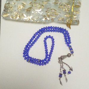 Shiny deep blue beaded silver tone leaf necklace
